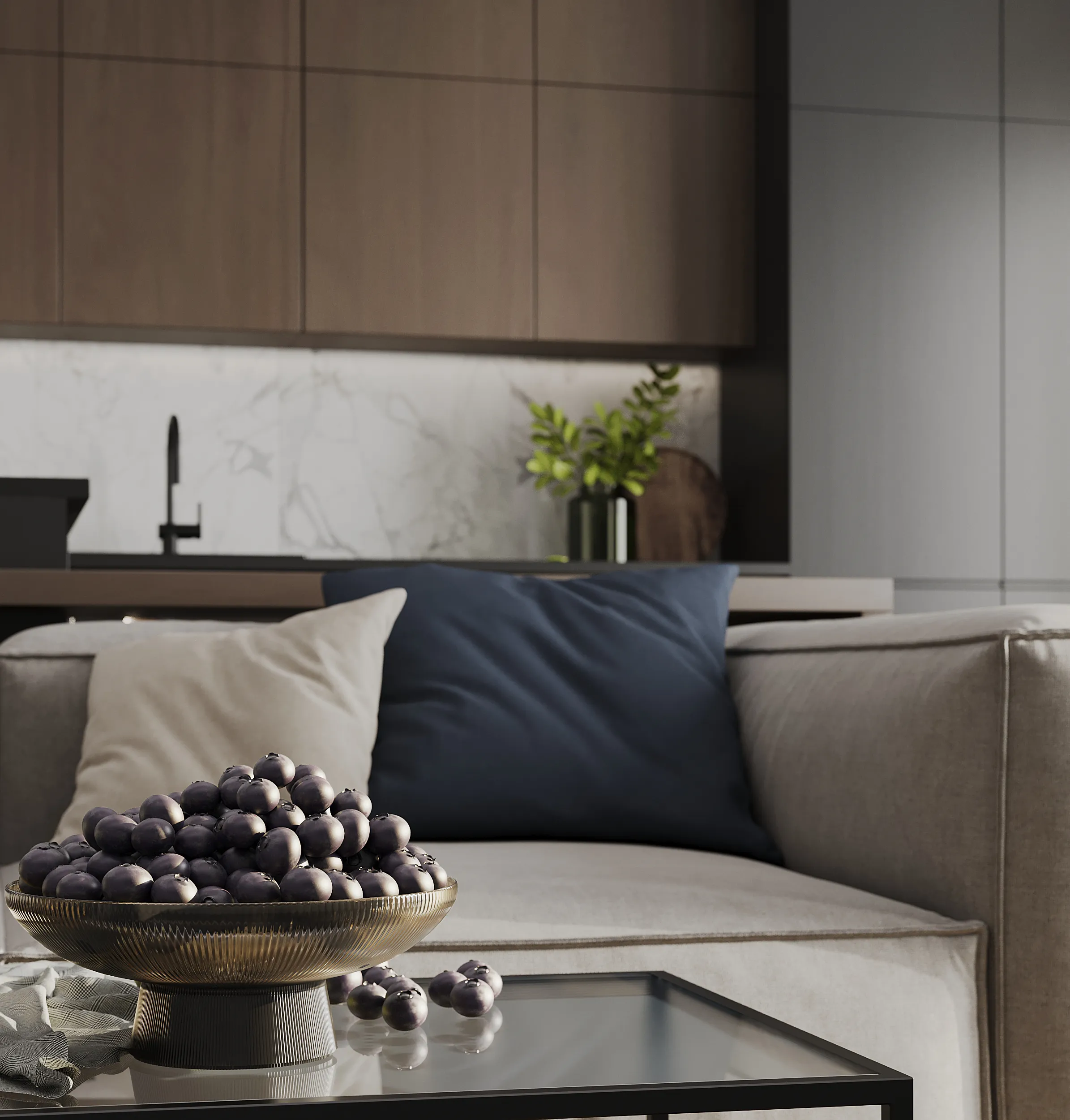 Decorative dark grape centerpiece on a ribbed bowl atop a glass table in a modern living area.